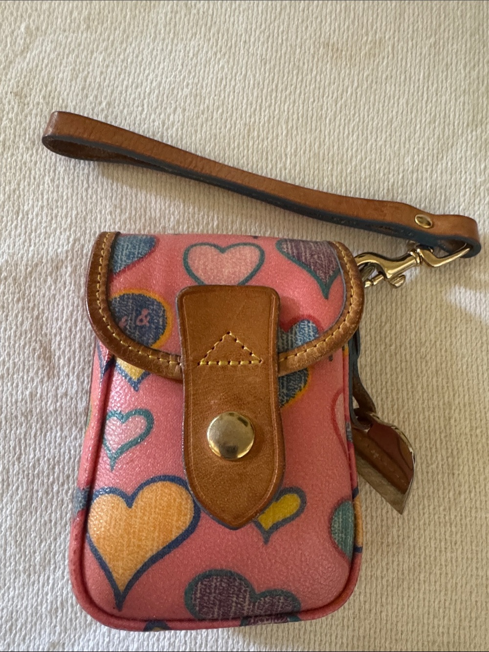 Pre- loved,Dooney & Bourke vintage snap wristlet/charm pouch in crayon hearts.